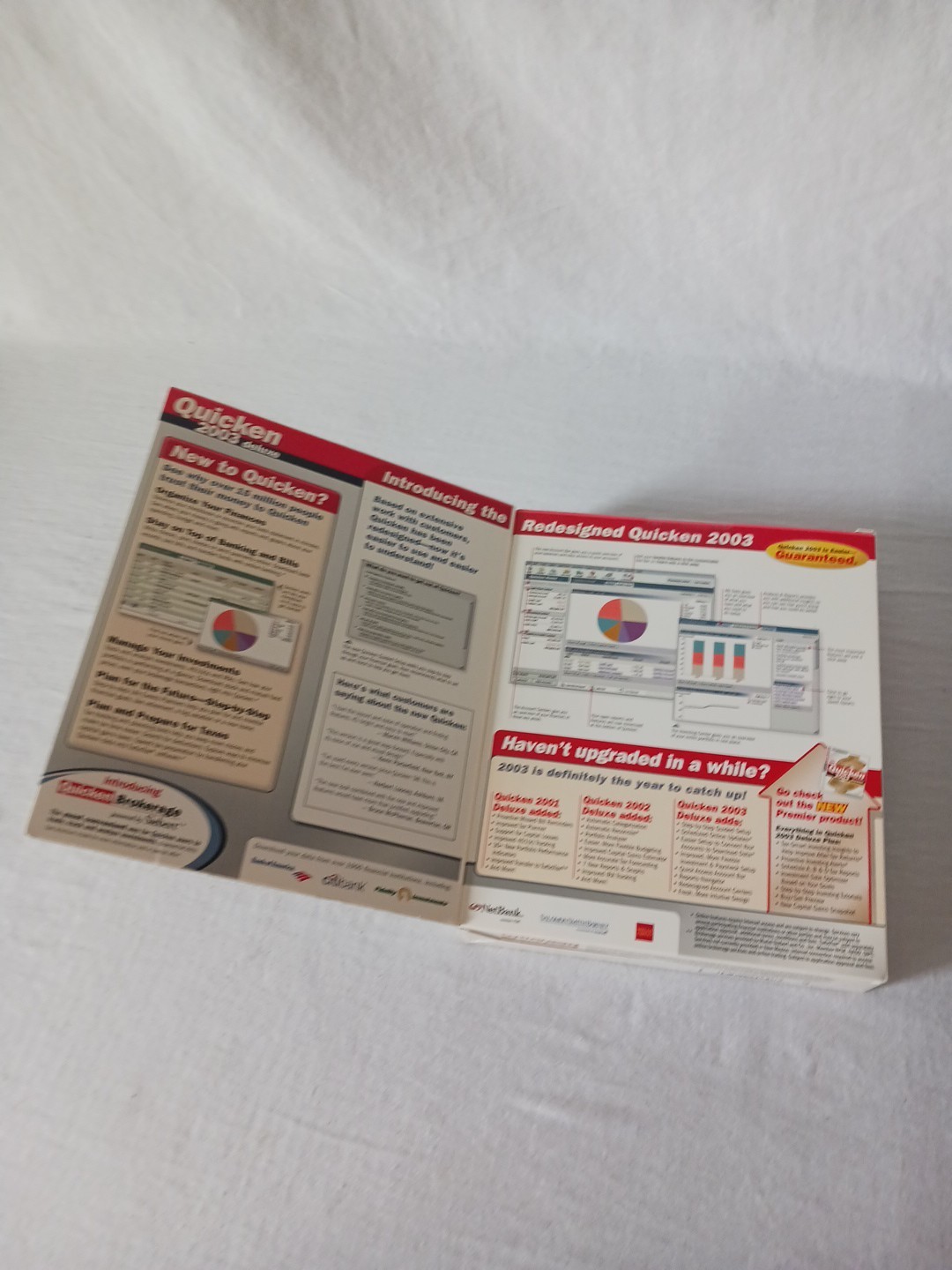 BRAND NEW FACTORY SEALED – Intuit Quicken 2003 Deluxe For Windows